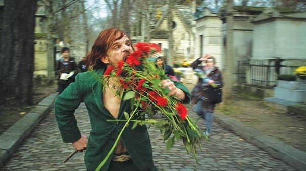 Denis Lavant, as "Oscar," portraying the Wild Man of Pere Lachaise