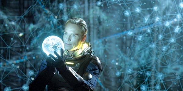 Earth, I presume: Michael Fassbender examines an intriguing orb.