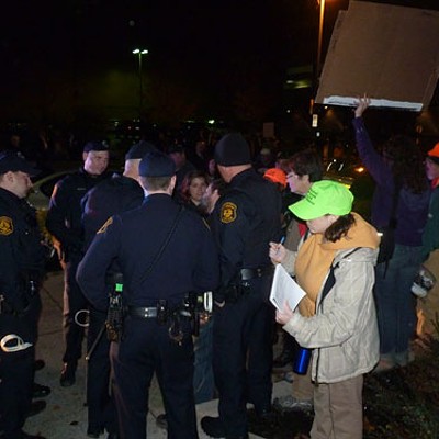 Occupiers face off with cops, Halliburton