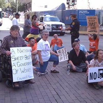 Transit protest calls out Corbett, results in arrests
