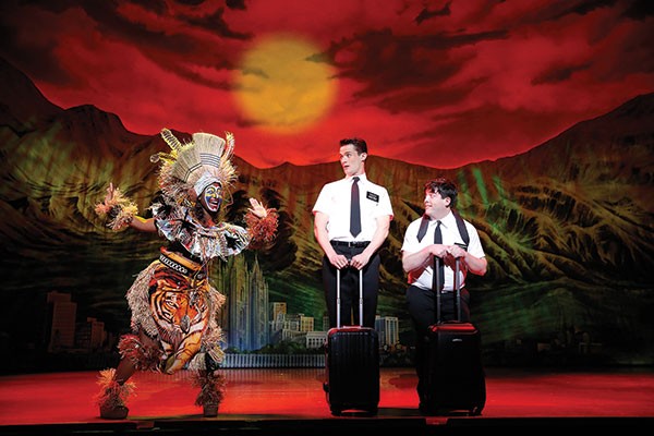 Stormin' Mormons: Mark Evans (center) and Christopher John O'Neill (right) with Phyre Hawkins in The Book of Mormon