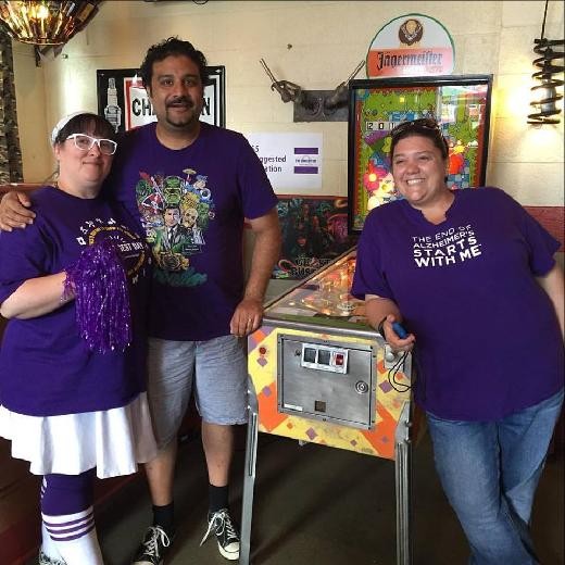 Hosts Amy Covell'Murthy, Mahesh Murthy, and Erin Ward from year 1 of the Flip Off Alzheimer's Pinball Tournament