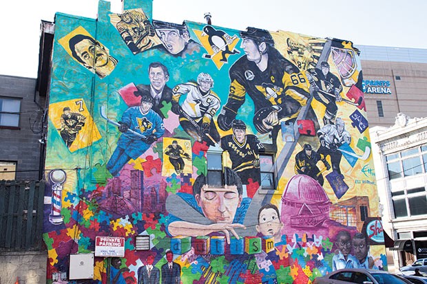 The city wants to bring more public art to Uptown, like this mural on Fifth Avenue near PPG Paints Arena, featuring the Pittsburgh Penguins and highlighting autism awareness