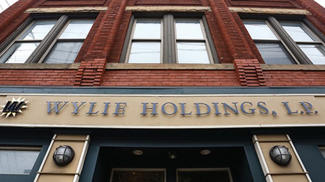 Wylie Holdings has cashed in on Lawrenceville’s revitalization, but is it being a good neighbor?