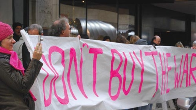 Anti-war groups spread their message to Black Friday crowds