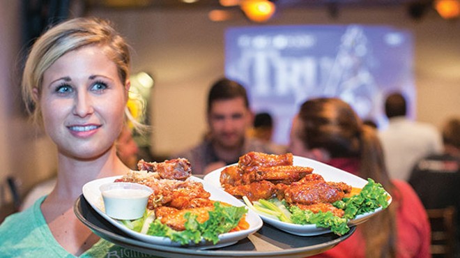 Comin' in hot: Bigham waitress Nikki Rockey, with a fresh plate of wings