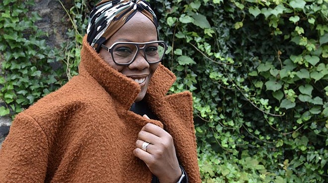 FashionAFRICANA founder Demeatria Boccella loves on UGG slippers and Haute Couture
