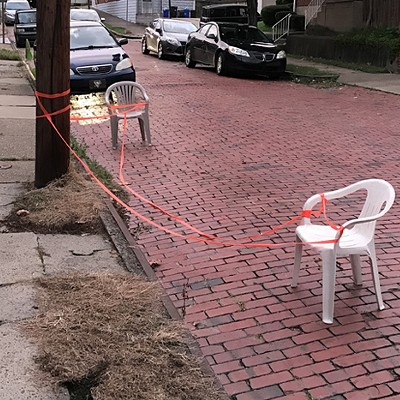 A parking chair on a brick road that has nothing to do with Palestine but does capture the forlorn vibe of trying to write about parking chairs while thinking about a horrific, intractable war.