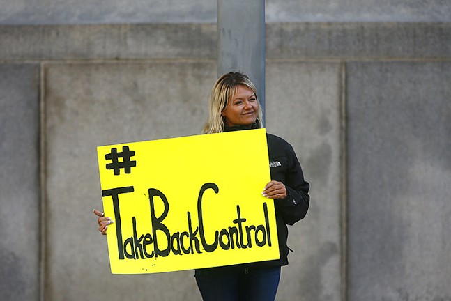 PHOTOS: About 120 protest in Downtown Pittsburgh, calling for Pennsylvania to reopen during coronavirus pandemic (12)