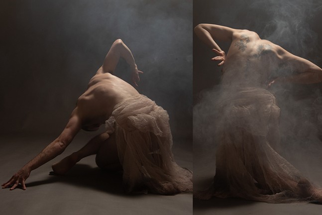 A dancer draped in gauzy material is photographed from behind.