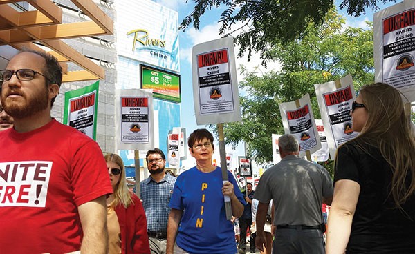 Workers and supporters picket at the Rivers Casino in August